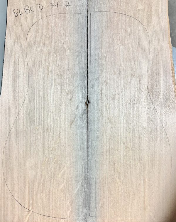Blue Bearclaw Guitar Top (BLBCD 74-2) showing light-colored, figured wood with a guitar body outline, ready for a custom build.