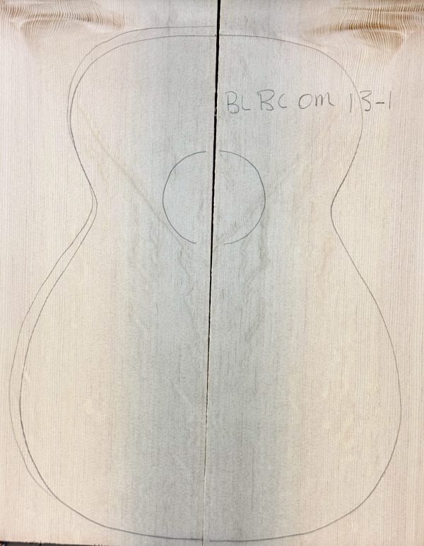 Pencil-outlined acoustic guitar body on joined light wood pieces (BLBCOM 13-1), showcasing fine vertical grain, ideal for Blue Bearclaw Guitar Tops.