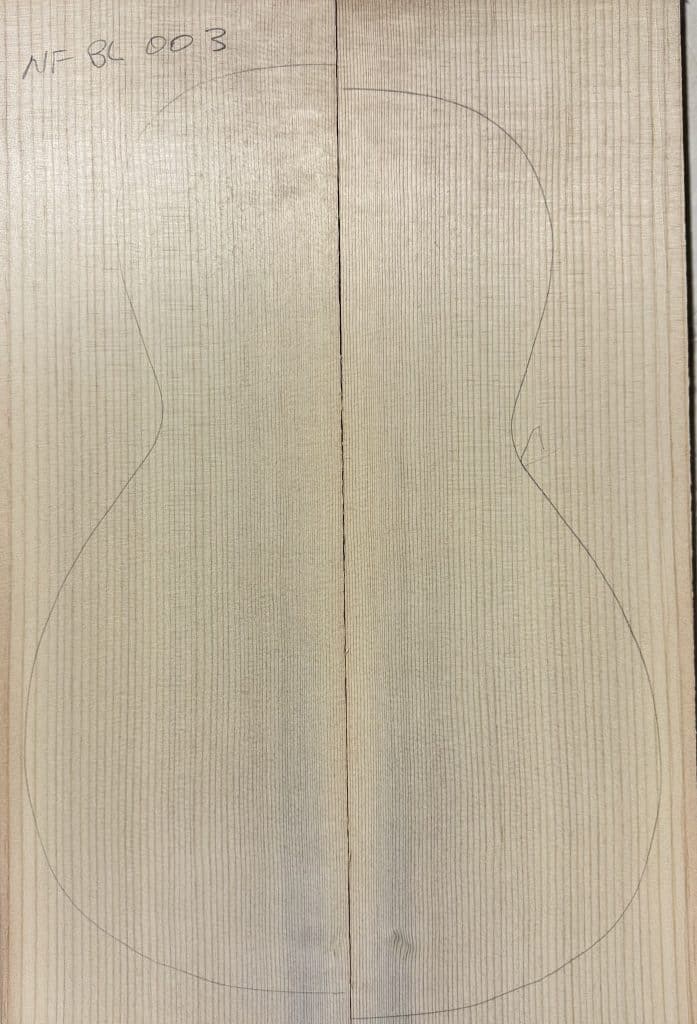 Two light-colored Non-Figured Guitar Tops, joined vertically, with a straight vertical grain, an acoustic guitar body outline, and 'NF BL 003' label.