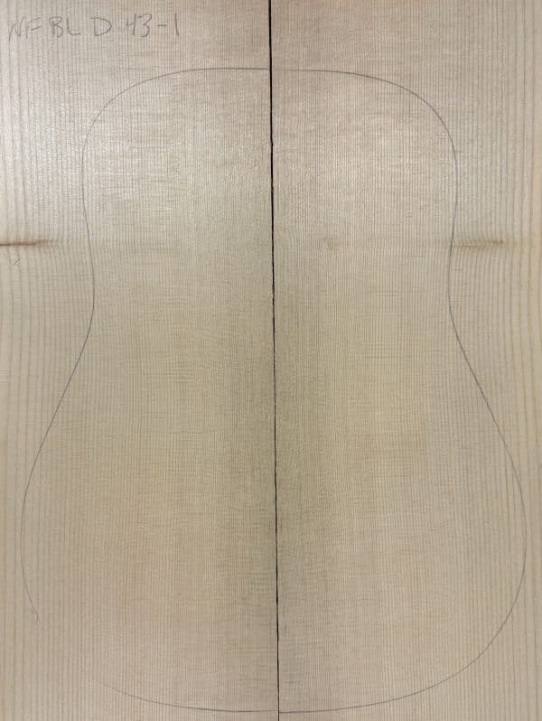 Book-matched Sitka spruce blanks with a pencil-drawn guitar body outline, demonstrating the raw material for One-of-a-Kind Guitar Tops.