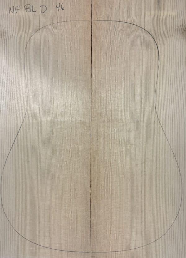 Bookmatched reclaimed Sitka Spruce panel outlined for a dreadnought acoustic guitar, showcasing our One-of-a-Kind Guitar Tops.