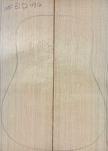 Bookmatched Sitka Spruce wood panel with a guitar body outline, ready for crafting One-of-a-Kind Guitar Tops. Labeled 'NF BLD 49-2'.