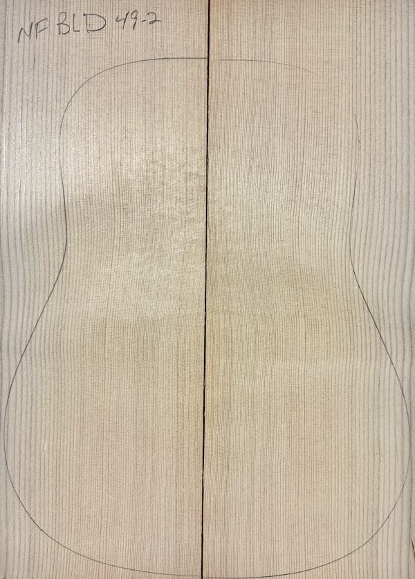 Bookmatched Sitka Spruce wood panel with a guitar body outline, ready for crafting One-of-a-Kind Guitar Tops. Labeled 'NF BLD 49-2'.