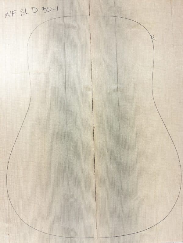 Light-toned, non-figured Sitka Spruce wood panels joined, with a pencil outline for acoustic guitar body, labeled 'NF BLD 50-1', representing One-of-a-Kind Guitar Tops.