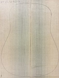 Blue non-figured Sitka Spruce wood pieces joined, outlined for One-of-a-Kind Guitar Tops.
