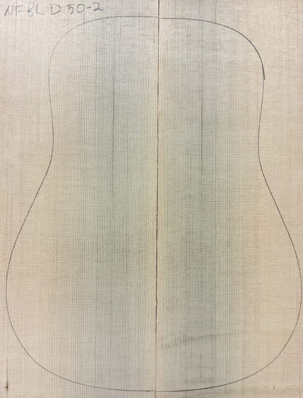 Blue non-figured Sitka Spruce wood pieces joined, outlined for One-of-a-Kind Guitar Tops.
